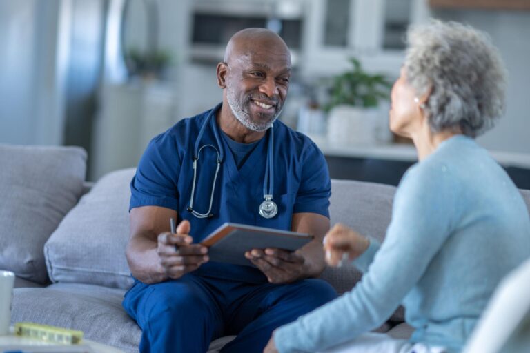 Caregiver assisting a senior in Canada